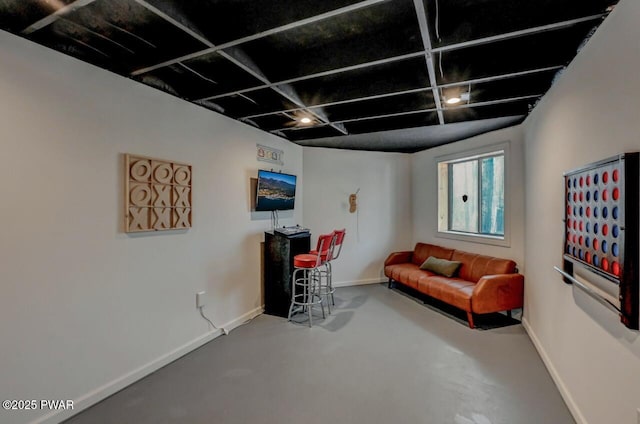 living room with concrete floors