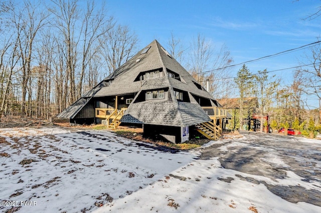 view of snow covered property