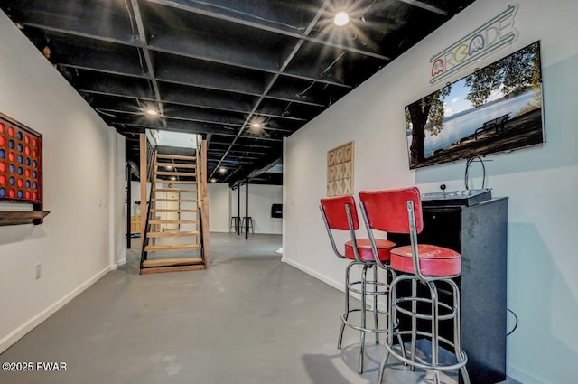 bar featuring concrete floors