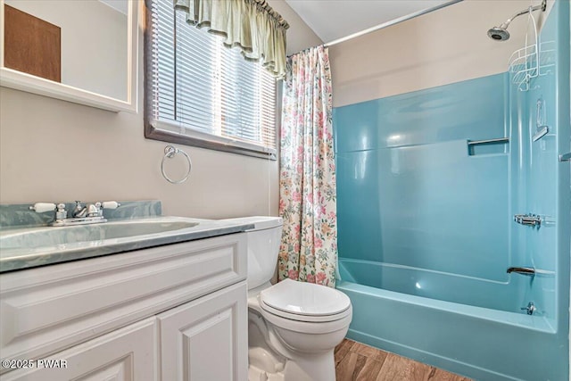 full bathroom featuring shower / bath combination with curtain, vanity, toilet, and wood-type flooring