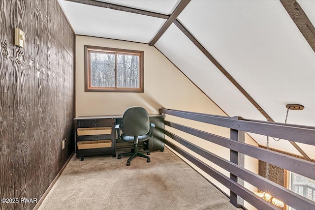 carpeted office space with lofted ceiling