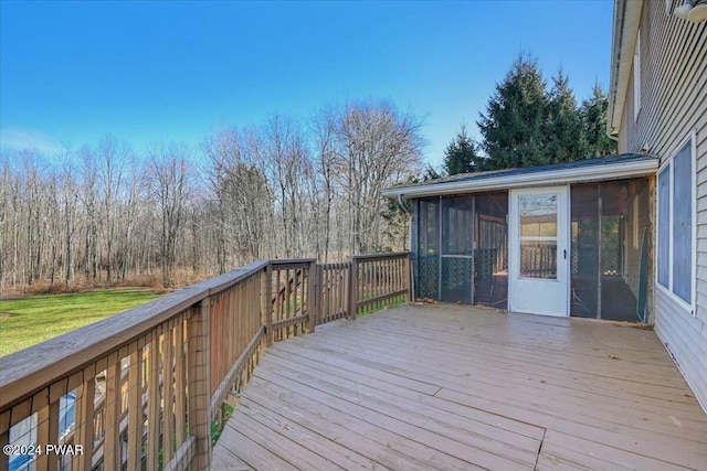 wooden deck featuring a sunroom