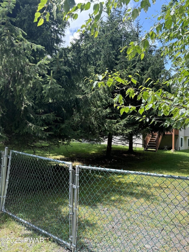 129 Skyview Rd, Dingmans Ferry, PA 18328 - view of yard with a gate and stairway