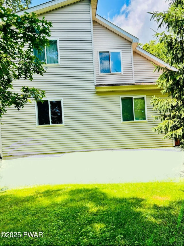 129 Skyview Rd, Dingmans Ferry, PA 18328 - view of home's exterior with a lawn