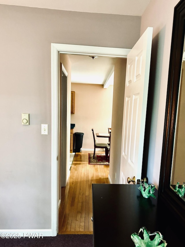 129 Skyview Rd, Dingmans Ferry, PA 18328 - hall featuring hardwood / wood-style floors and baseboards