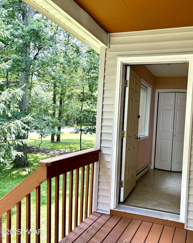 129 Skyview Rd, Dingmans Ferry, PA 18328 - wooden deck with baseboard heating and a lawn