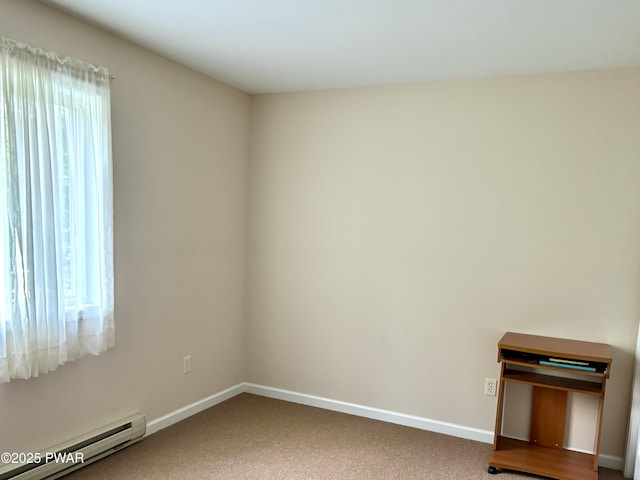 129 Skyview Rd, Dingmans Ferry, PA 18328 - spare room with a baseboard heating unit and carpet flooring