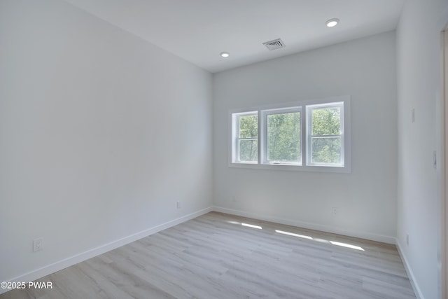 131 Song Mountain Dr, Tafton, PA 18464 - empty room with wood finished floors and recessed lighting
