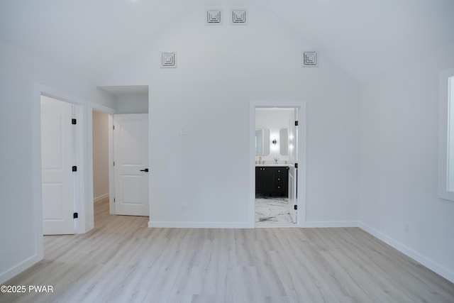 131 Song Mountain Dr, Tafton, PA 18464 - unfurnished room with high vaulted ceiling and light wood-style floors