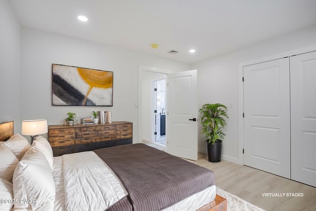 131 Song Mountain Dr, Tafton, PA 18464 - bedroom featuring light wood finished floors, recessed lighting, and a closet