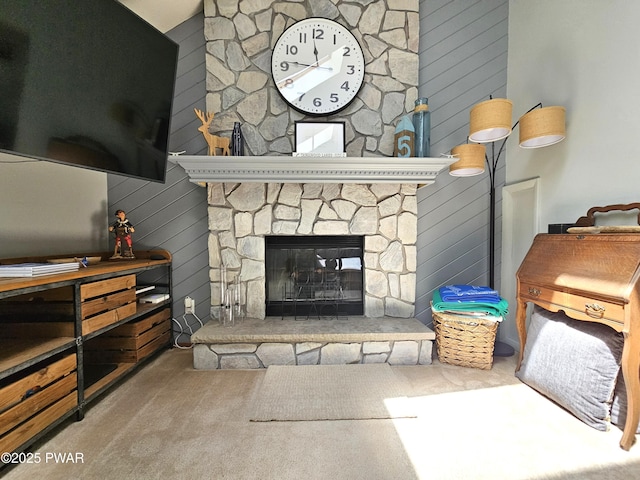 101 Summit Dr, Greentown, PA 18426 - living area with carpet floors, wood walls, and a stone fireplace