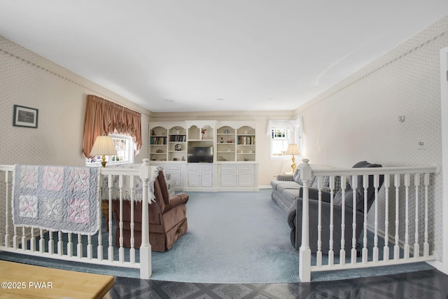 carpeted bedroom featuring wallpapered walls