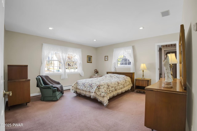 carpeted bedroom with baseboards, baseboard heating, and recessed lighting