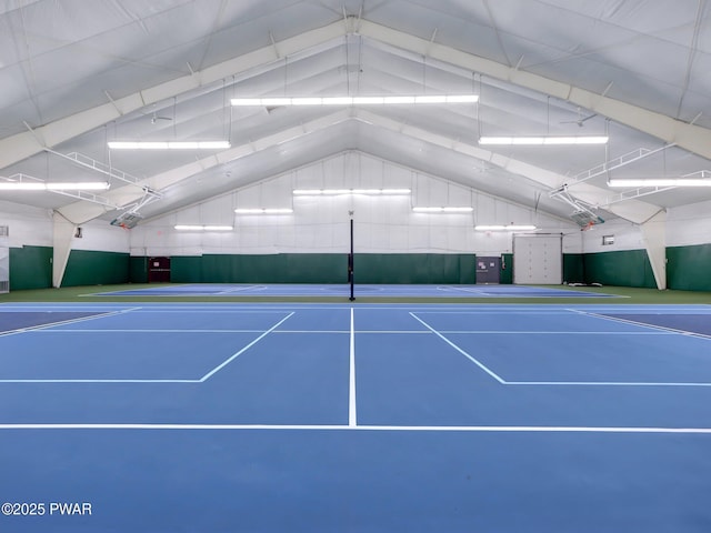 view of tennis court with community basketball court