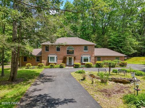 3043 Hemlock Rd, Stroudsburg, PA 18360 - colonial house featuring asphalt driveway