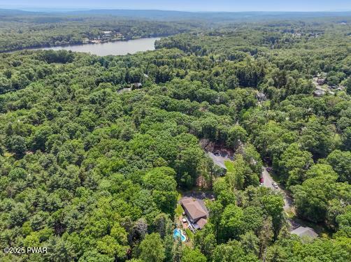 3043 Hemlock Rd, Stroudsburg, PA 18360 - bird's eye view of a heavily wooded area and a nearby body of water