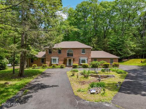 3043 Hemlock Rd, Stroudsburg, PA 18360 - colonial-style house featuring driveway