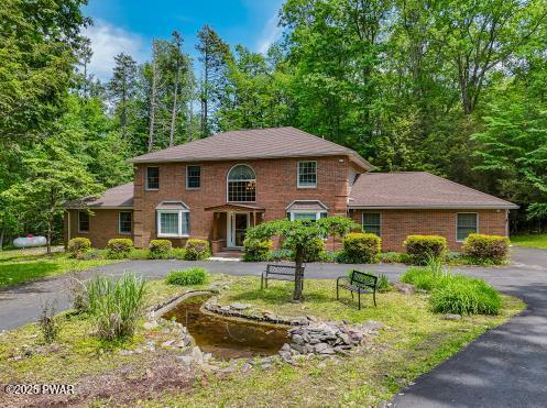 3043 Hemlock Rd, Stroudsburg, PA 18360 - view of front of house featuring driveway