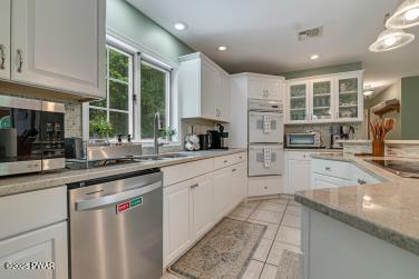 3043 Hemlock Rd, Stroudsburg, PA 18360 - kitchen with appliances with stainless steel finishes, a sink, white cabinetry, and recessed lighting