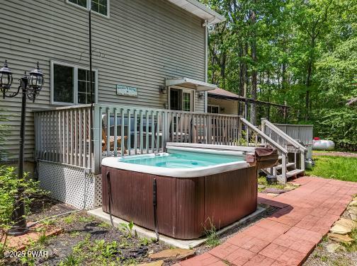 3043 Hemlock Rd, Stroudsburg, PA 18360 - view of pool with a hot tub and a wooden deck