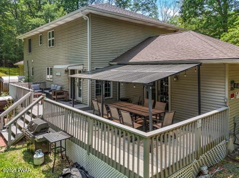 3043 Hemlock Rd, Stroudsburg, PA 18360 - wooden deck featuring outdoor dining area and outdoor lounge area