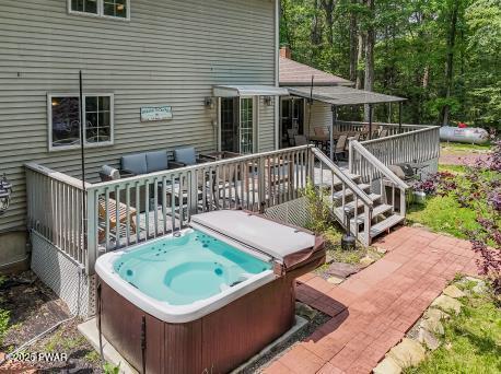 3043 Hemlock Rd, Stroudsburg, PA 18360 - view of patio / terrace with a hot tub and a deck