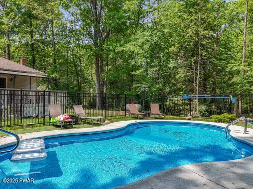 3043 Hemlock Rd, Stroudsburg, PA 18360 - view of pool featuring a view of trees