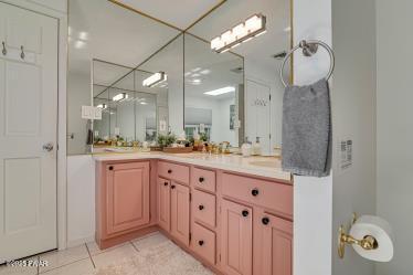 3043 Hemlock Rd, Stroudsburg, PA 18360 - full bath featuring vanity, tile patterned flooring, and a shower