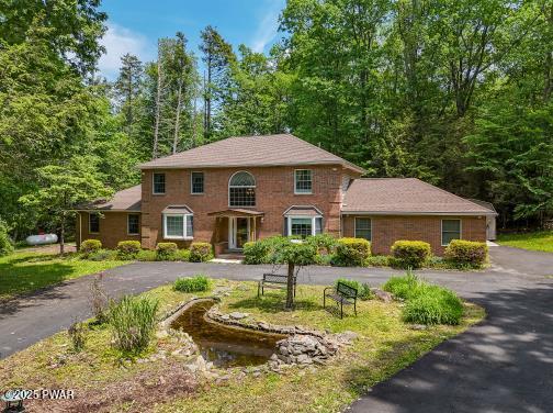 3043 Hemlock Rd, Stroudsburg, PA 18360 - view of front of house featuring driveway