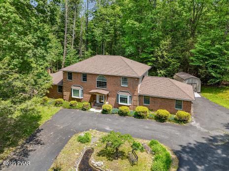 3043 Hemlock Rd, Stroudsburg, PA 18360 - view of front of home with driveway and a view of trees