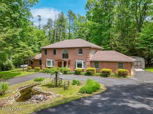 3043 Hemlock Rd, Stroudsburg, PA 18360 - view of front facade with a garage