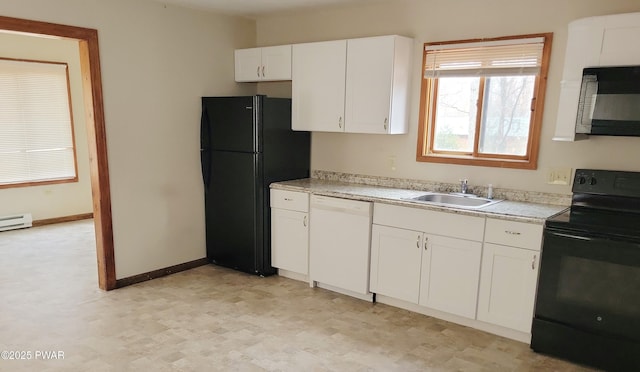 kitchen featuring sink, white cabinets, and black appliances