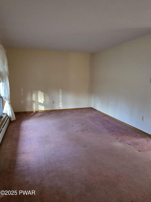 unfurnished room featuring carpet flooring