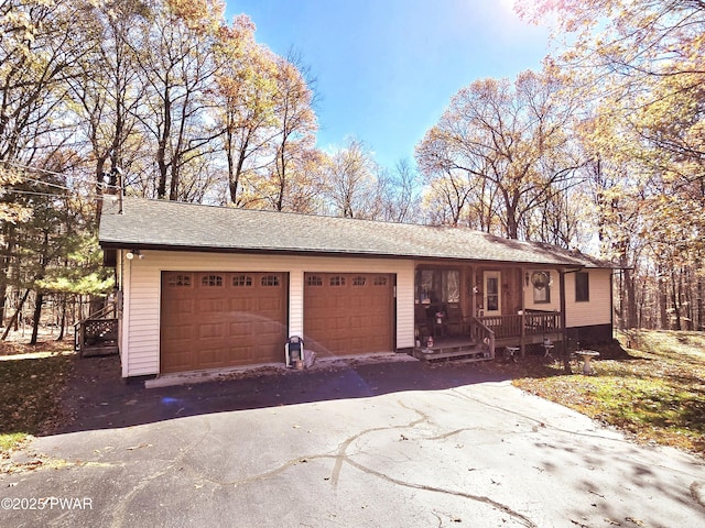 single story home with a garage