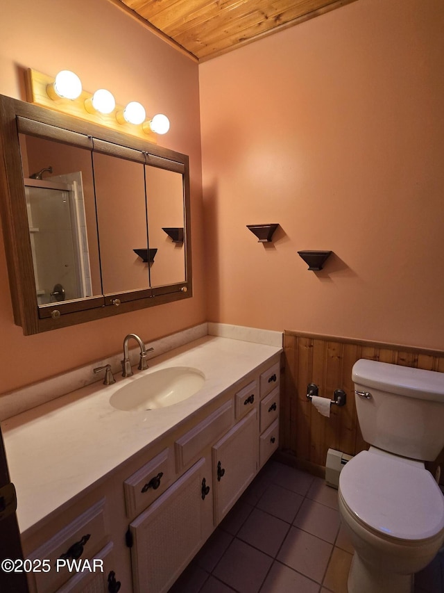 bathroom with wood ceiling, tile patterned floors, vanity, walk in shower, and wood walls