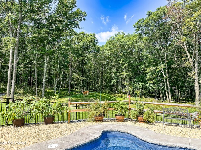 view of property exterior featuring a lawn and a garage