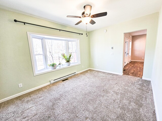 bathroom with a baseboard radiator and hardwood / wood-style flooring