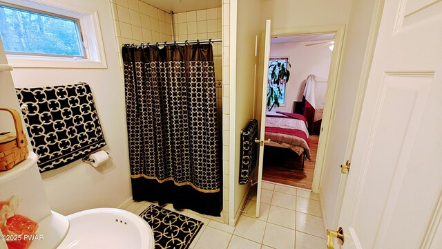 177 Crane Rd, Lakeville, PA 18438 - bathroom featuring a shower with curtain, tile patterned floors, and connected bathroom