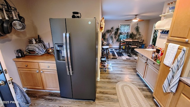 177 Crane Rd, Lakeville, PA 18438 - kitchen featuring stainless steel fridge, a ceiling fan, light wood-style floors, and light countertops