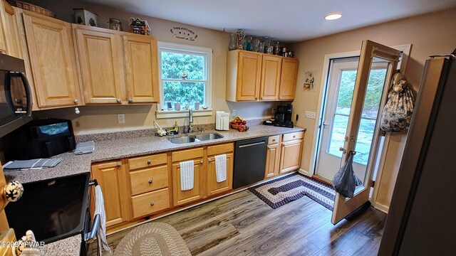 177 Crane Rd, Lakeville, PA 18438 - kitchen featuring black appliances, light brown cabinetry, light wood-style flooring, recessed lighting, and french doors