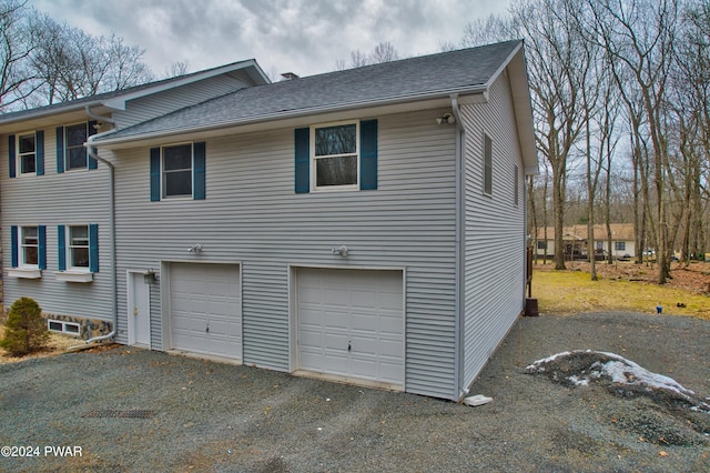 exterior space with a garage