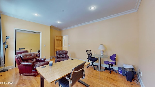 office with wood-type flooring and crown molding