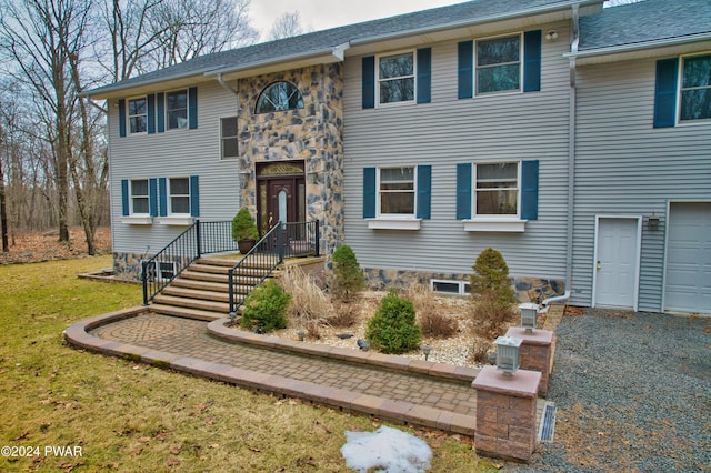 view of front of house with a front lawn