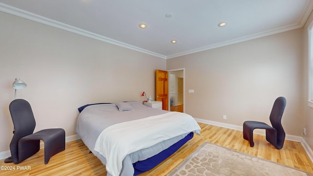 bedroom featuring crown molding and wood-type flooring