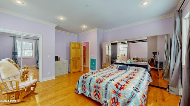 bedroom with crown molding and light wood-type flooring