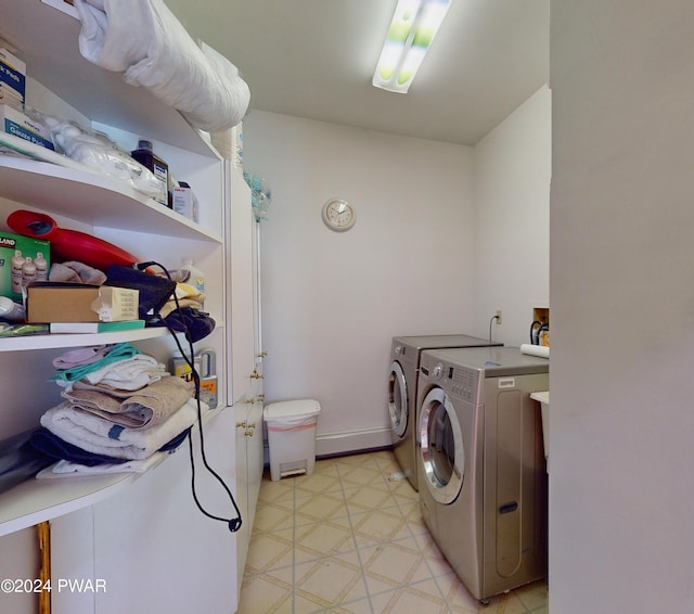 laundry room with washer and dryer