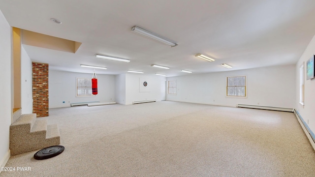 basement with carpet and a baseboard radiator