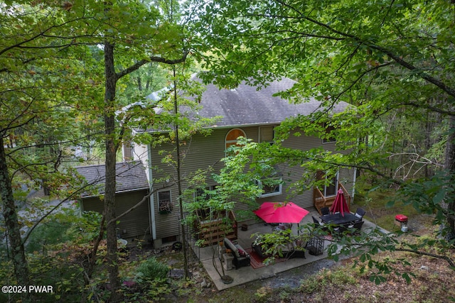 view of home's exterior with a patio