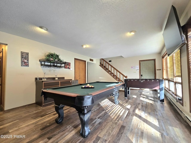 game room with dark wood-type flooring, a textured ceiling, billiards, and baseboard heating