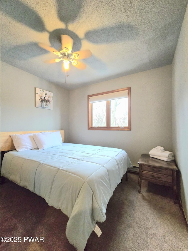 bedroom featuring ceiling fan and carpet floors